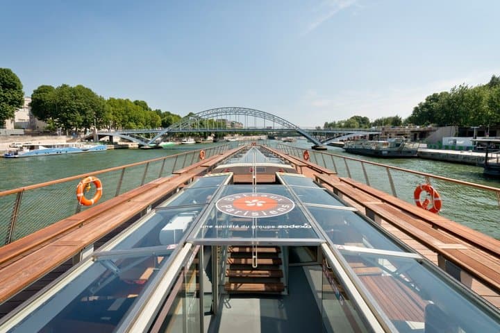 Paris Eiffel Tower District Tour and Seine River Cruise