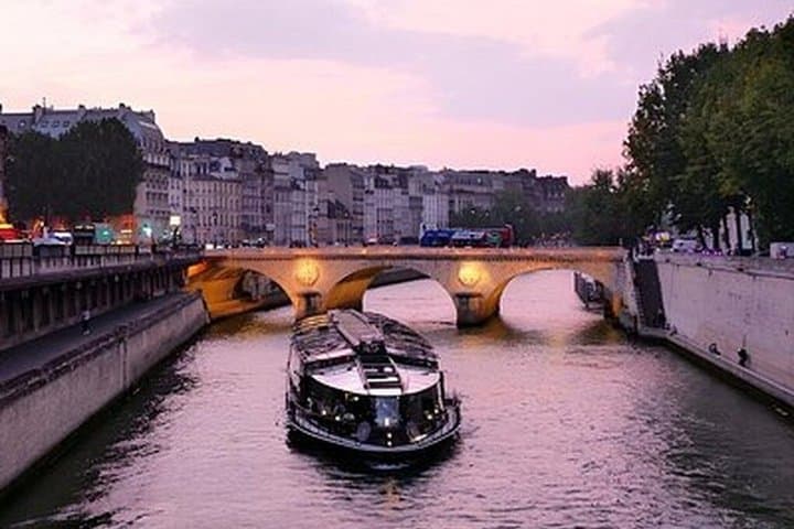 Eiffel Tower, Seine Cruise and Notre-Dame Paris Highlights Tour